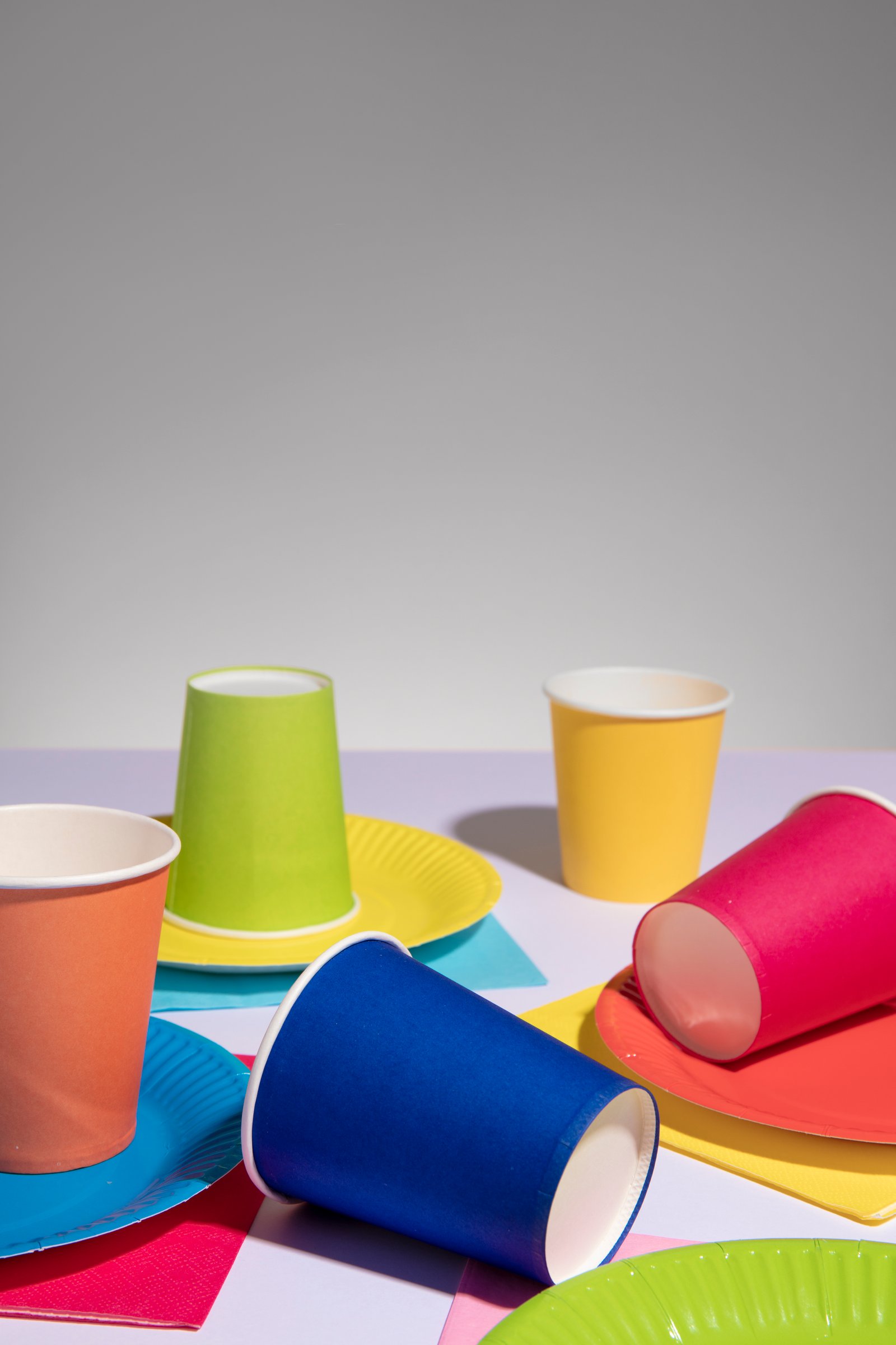 high-angle-colorful-party-cups-assortment